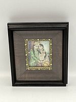Front view of framed antique Indian watercolour painting of a courting couple, showing the full framed artwork.