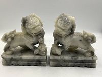 Front view of both Foo dog bookends side by side