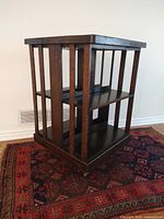 Three-quarter view showing slatted side panels, shelf layout and overall form