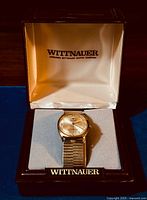 Watch and Wittnauer presentation box, top view showing lid interior branding