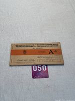 Front and back cover of the 1942 Canadian Gasoline Licence & Ration Coupon Book showing category A-1 and licence number