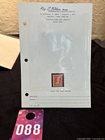 Stamp mounted on a dealer's protective page with handwritten and printed info including "Cat. No. 9" and dealer info from Roy S. Wilton, Toronto.