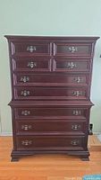 Full front view of the two-piece highboy dresser