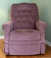 Front view of mauve upholstered Lay-Z-Boy recliner showing tufted backrest and rolled arms.