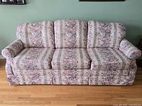 Front view of the three-cushion Lay-Z-Boy sofa showing overall floral upholstery and shape.