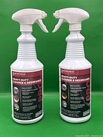 Two white spray bottles of Bioesque Heavy-Duty Cleaner & Degreaser shown front view with labels visible.