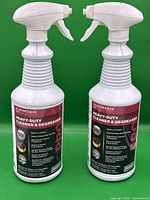 Two white plastic 1 quart bottles with spray nozzles labeled "Bioesque Heavy-Duty Cleaner & Degreaser"