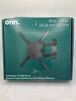 Front view of the ONN branded TV wall mount box showing model information and size compatibility.