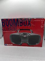 Original packaging box for the Proscan Boombox CD Radio Bluetooth showing the front image of the product and branding details.