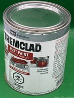 Overall view of the Tremclad paint can showing brand, size, and usage details on the label.