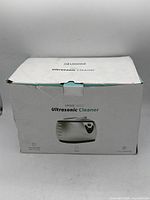 Box of Ukoke 3800S Ultrasonic Cleaner showing product image and model details on front.