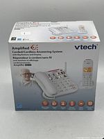 Box showing front image of VTech Amplified Corded/Cordless Answering System with big buttons and display.
