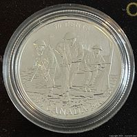 Obverse of the coin showing World War II soldiers in combat with '50 CENTS CANADA 2005' inscriptions.