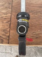 Close-up image of the pneumatic dent puller head, showing Central Pneumatic branding and air inlet with 150 psi maximum pressure rating.