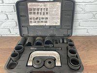 Overall open case showing all components laid out in compartments