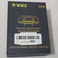 Box of WIEZ D020 GPS Pet Electronic Fence Equipment with branding and satellite system info
