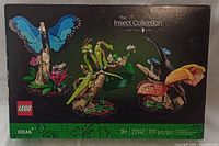 Front view of the sealed LEGO Insect Collection box showing all three insect models: butterfly, mantis, and beetle.