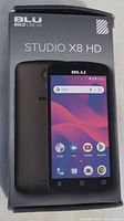 Front view of the box showing the BLU Studio X8 HD branding and phone image.