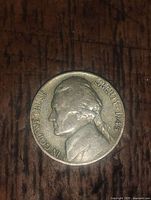 Obverse side of 1945 Jefferson Nickel showing Thomas Jefferson's profile with inscriptions and date.