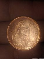 Front side of the coin showing the 'ONE PENNY' inscription, Britannia figure, and the year '1967'.