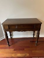 Front view of desk with top closed