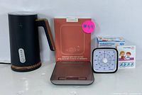 Set showing black milk frother, Crownful digital kitchen scale with box, and Yocabt mechanical timer