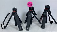 Front view of all three tripods showing their legs and build