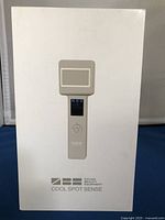 Box packaging of the Cool Spot Sense device showing branding and device illustration.