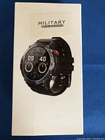 Box showing FitCloudPro Military Titanium Endurance smartwatch image and name.