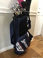 Full view of Srixon stand golf bag with clubs and headcovers