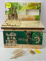 Wood Trick 3D Wooden Carousel Puzzle kit in original branded packaging with instruction sheets and wooden pieces flat-packed.