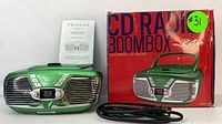 Full view of the Proscan CD Radio Boombox with power cord, original box, and manual.