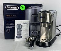 DeLonghi Dedica Arte machine with original box, instruction manual, portafilter and filter baskets