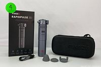 Primary photo showing the Fikeze RapidPulse 3D massager device, three silicone massage heads, black carrying case, charging cable, and product brochure.