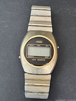 Front view of the men's vintage Nordan LED LCD quartz watch showing dial and metal band.