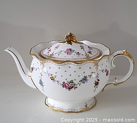Front view of entire teapot showing shape, pattern and proportions