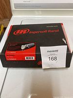 Closed black and red Ingersoll Rand branded box showing lot sticker