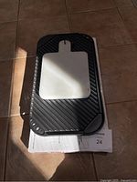 Marble mini board placed on top of Nordic Ware grill griddle, showing relative size and surface details.