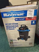 Box front showing Mastervac wet/dry vacuum brand, 30L capacity, 4 HP peak power.