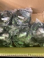 Box containing 10 sealed RG59U BNC M/M 50ft cables with labels visible through plastic bagging.