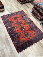 Full view of the flat-laid rug showing overall pattern and colors