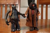 Both Hagrid and Troll figures side by side on a table surface