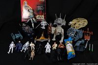 Full lot view showing Star Wars action figures, vehicles, and sealed C3PO kids seat box