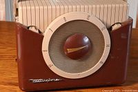 Front view of vintage Westinghouse radio showing tuning dial, side knobs, and Westinghouse logo.