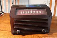 Front view of vintage RCA Victor radio showing tuning dial and two knobs.