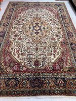 Top-down view of full rug showing central medallion and border