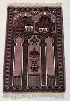 Full view of light brown Turkman prayer rug with mosque and architectural patterns.