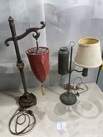 Both vintage lamps side-by-side showing different styles and shades