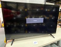 Front view of the 39-inch Vizio flat screen TV powered on, displaying 'No Signal'.
