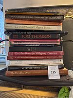 Stack of 15 various large coffee table books on diverse subjects